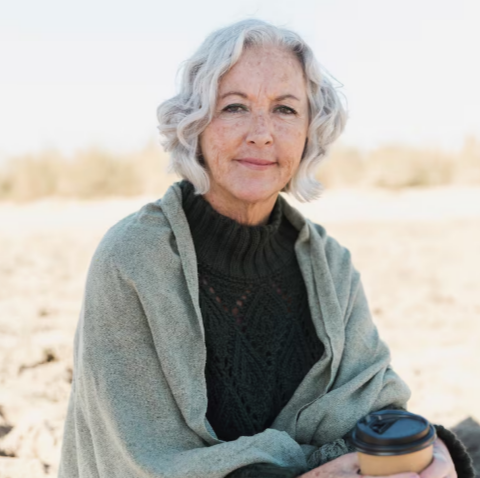 Portrait of a widowed mature woman outdoors